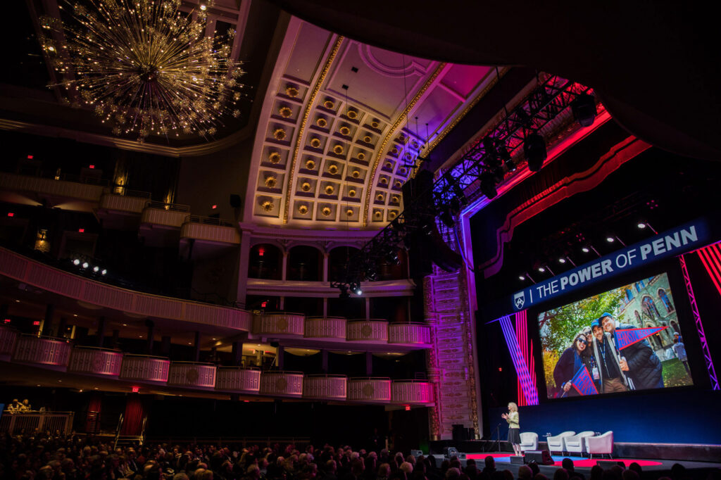 An overview of the stage and audience at The Power of Penn road show.